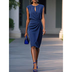 Solid color pleated waist round neck hollow dress