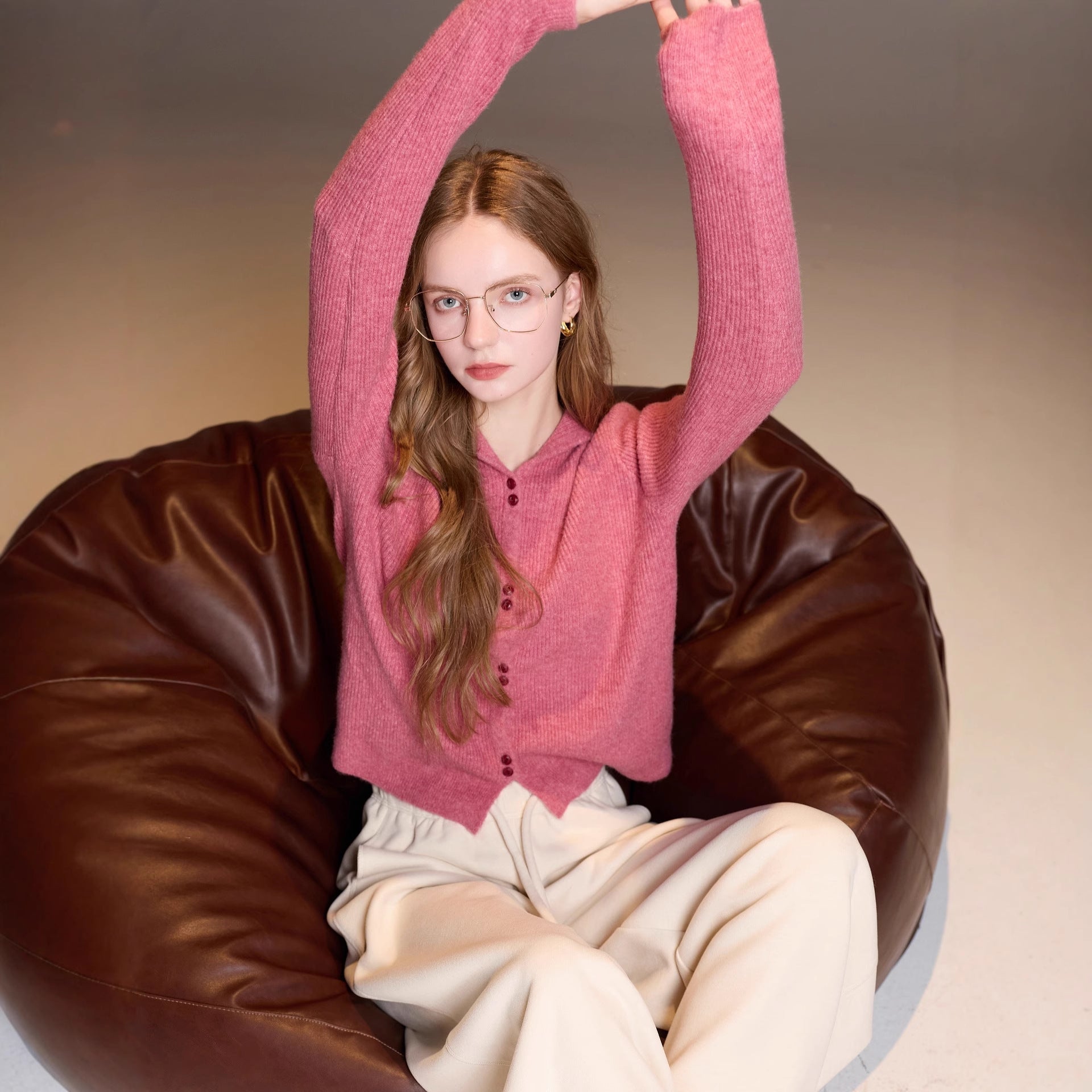 Hooded cardigan over wool jacket