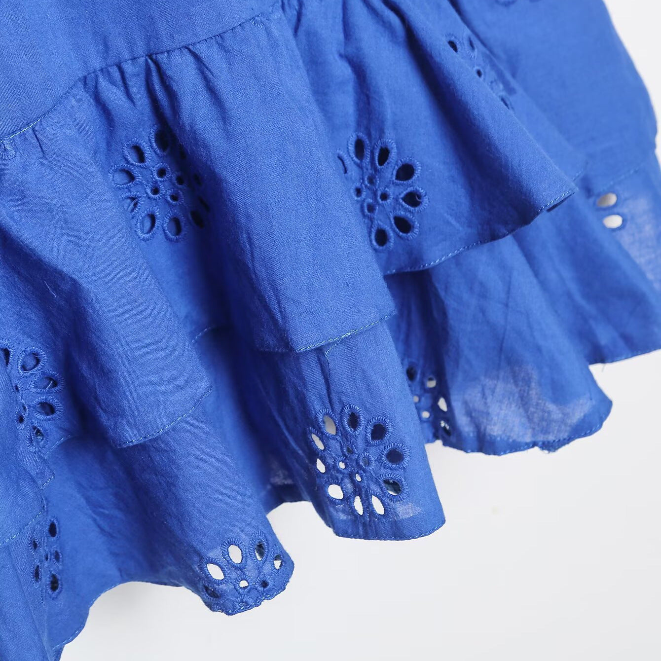 Laminated decorative hollow short dress
